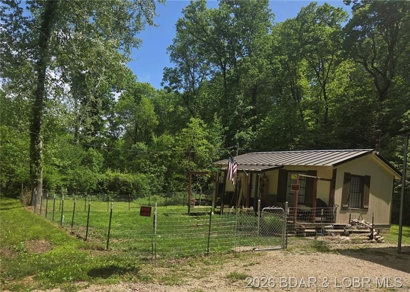 This affordable cabin in the woods is a smart pick for investors - photo 2