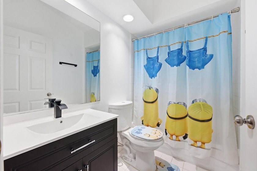Spacious home with high ceilings and a bright, open layout. The - photo 22