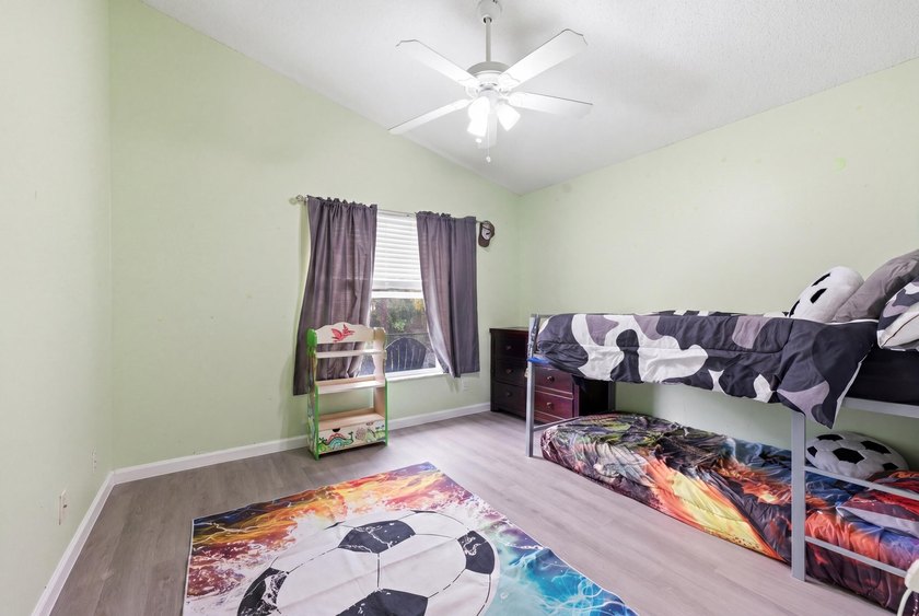 Spacious home with high ceilings and a bright, open layout. The - photo 23