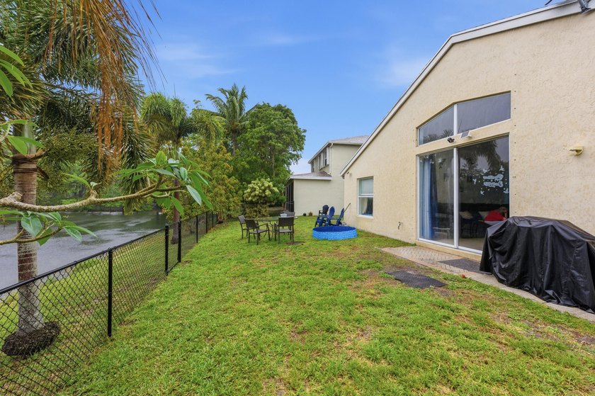 Spacious home with high ceilings and a bright, open layout. The - photo 27