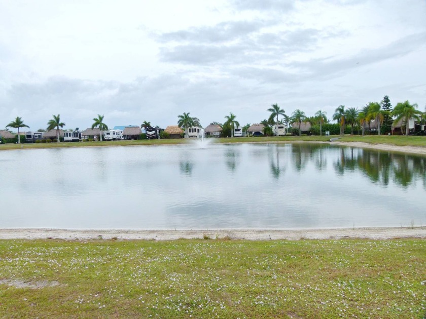 Beautiful Lakefront Lot in a 5-Star Gated Community Experience - photo 18