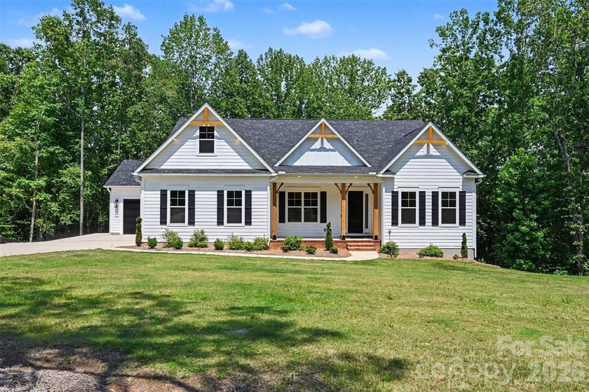 Move-in ready new construction in the gated lakefront community - photo 7