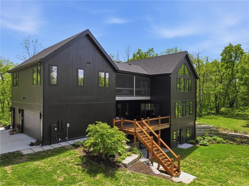 Welcome to a modern masterpiece set on 30-acres that captures - photo 3