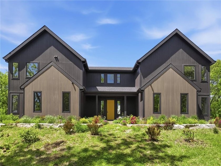 Welcome to a modern masterpiece set on 30-acres that captures - photo 4