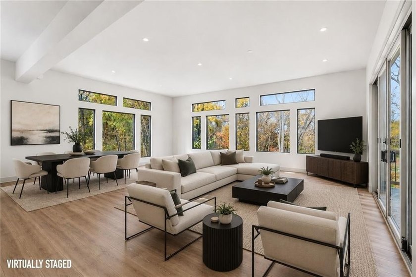 Welcome to a modern masterpiece set on 30-acres that captures - photo 8