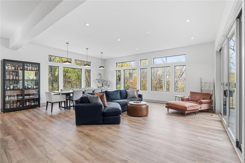 Welcome to a modern masterpiece set on 30-acres that captures - photo 9