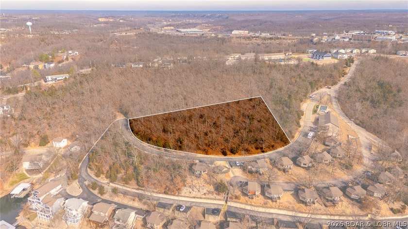 This Southern facing parcel is a very rare find at Lake of the - photo 2