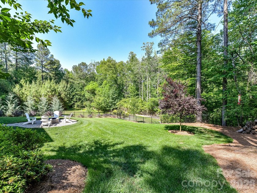 Nestled on a private, wooded lot in desirable Falls Cove near - photo 4