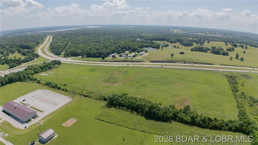 Prime 14-acre tract with 1700' of Highway 65 frontage! This - photo 2