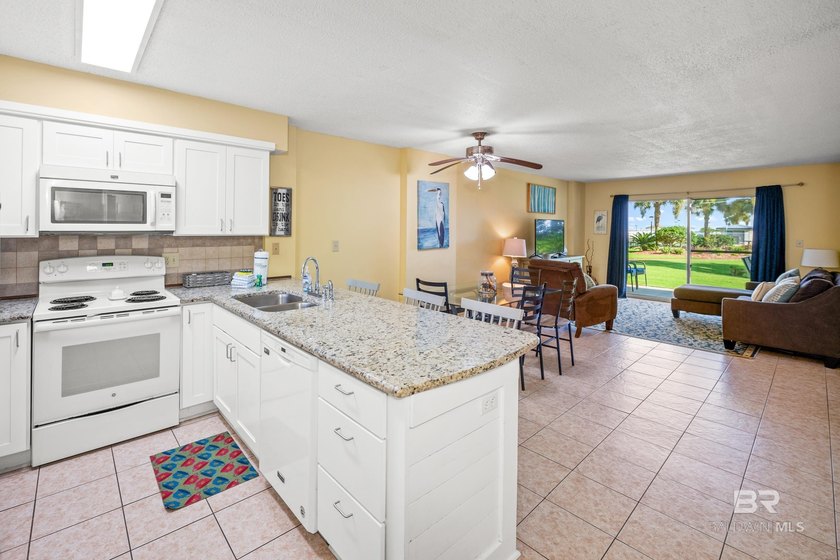 Experience the best of coastal living in this updated 2-bedroom - photo 8