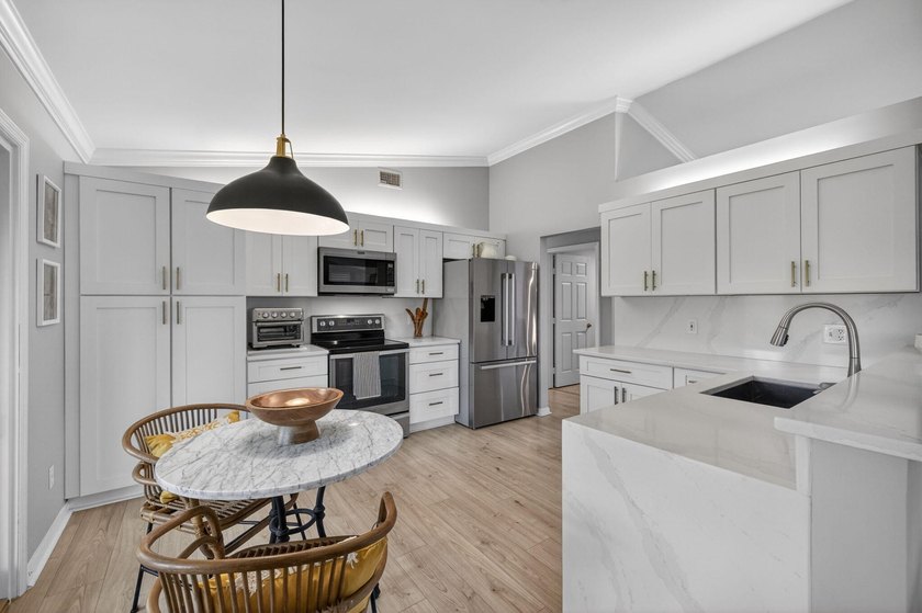 This beautifully renovated home offers modern upgrades, timeless - photo 16