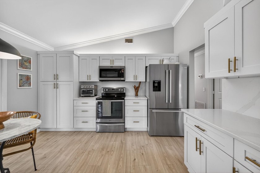 This beautifully renovated home offers modern upgrades, timeless - photo 18
