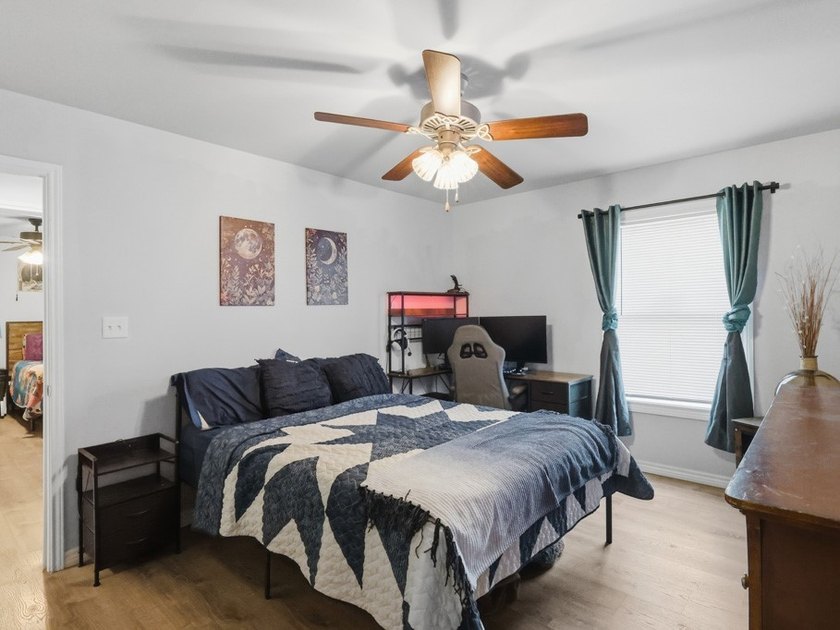 Built in 2021, this 3-bedroom, 2-bath coastal cottage sits on - photo 12