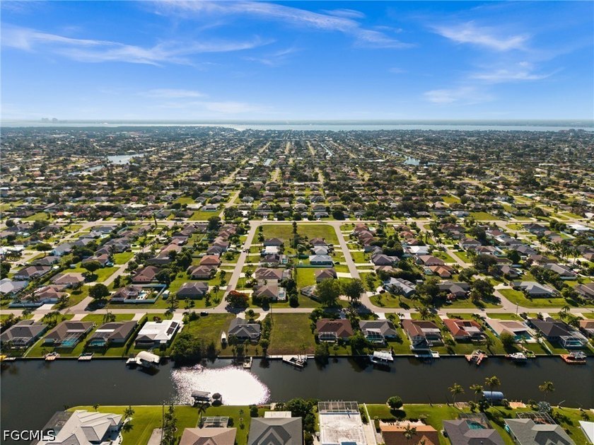 GULF ACCESS LOT WITH A NEWER SEAWALL, DOCK, CAPTAIN'S WALK, AND - photo 13