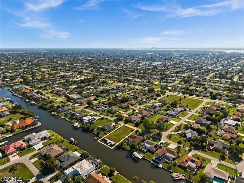 GULF ACCESS LOT WITH A NEWER SEAWALL, DOCK, CAPTAIN'S WALK, AND - photo 14