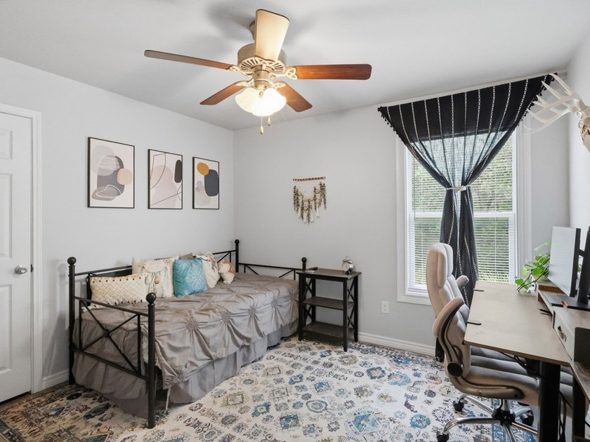 Built in 2021, this 3-bedroom, 2-bath coastal cottage sits on - photo 15