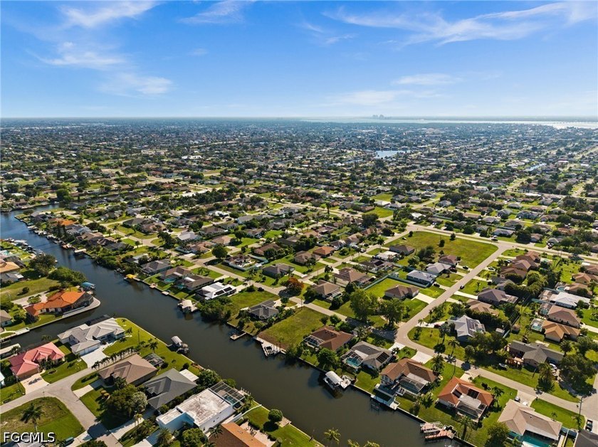 GULF ACCESS LOT WITH A NEWER SEAWALL, DOCK, CAPTAIN'S WALK, AND - photo 15