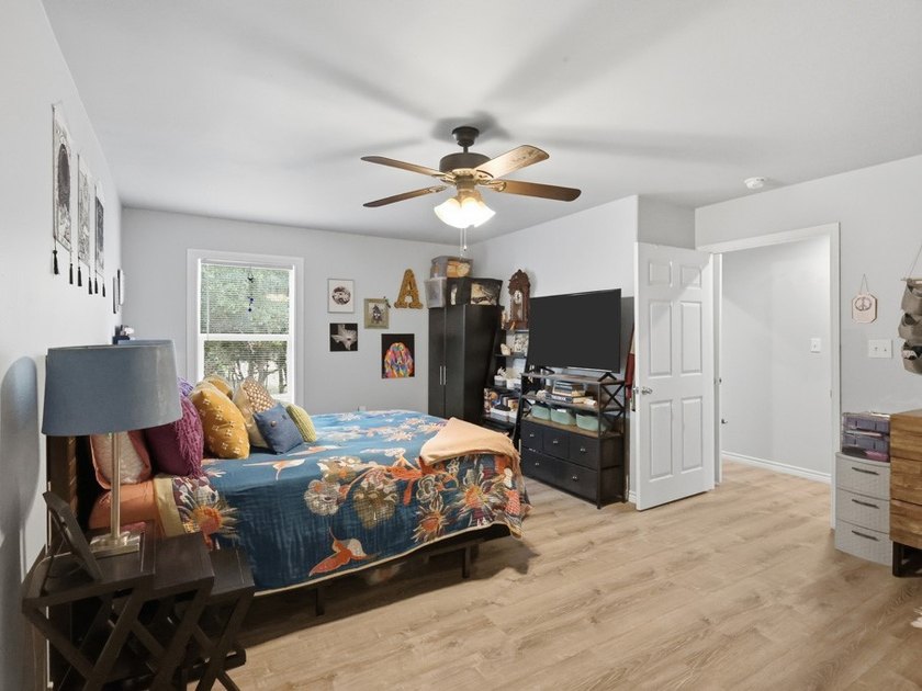 Built in 2021, this 3-bedroom, 2-bath coastal cottage sits on - photo 20