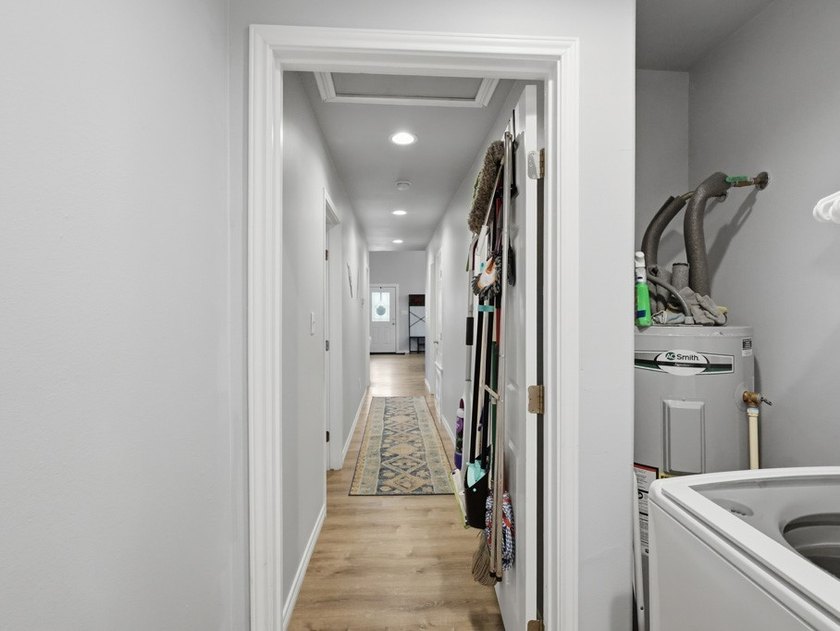 Built in 2021, this 3-bedroom, 2-bath coastal cottage sits on - photo 22