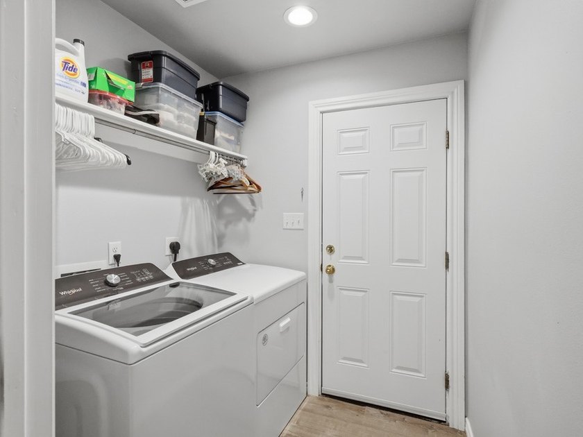 Built in 2021, this 3-bedroom, 2-bath coastal cottage sits on - photo 23