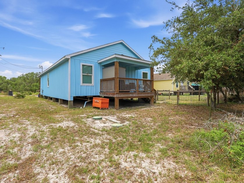 Built in 2021, this 3-bedroom, 2-bath coastal cottage sits on - photo 25
