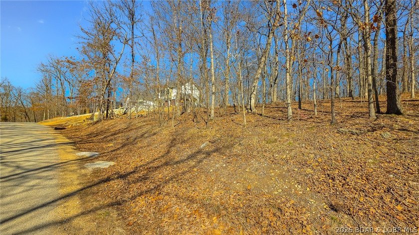 Escape to the resort-style living of Porto Cima. This 0.61-acre - photo 2