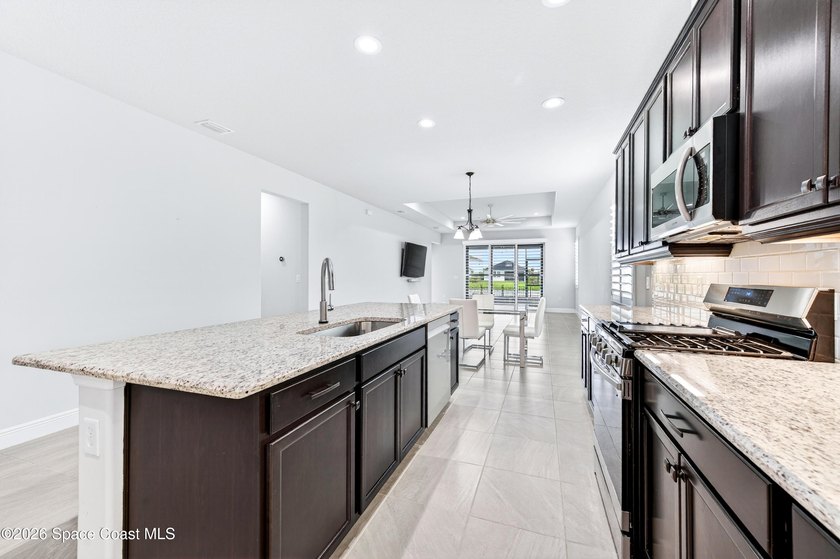 PANGEA PARK LAKEFRONT GEM IN WEST VIERA! Stunning 4-bedroom, 2 - photo 15