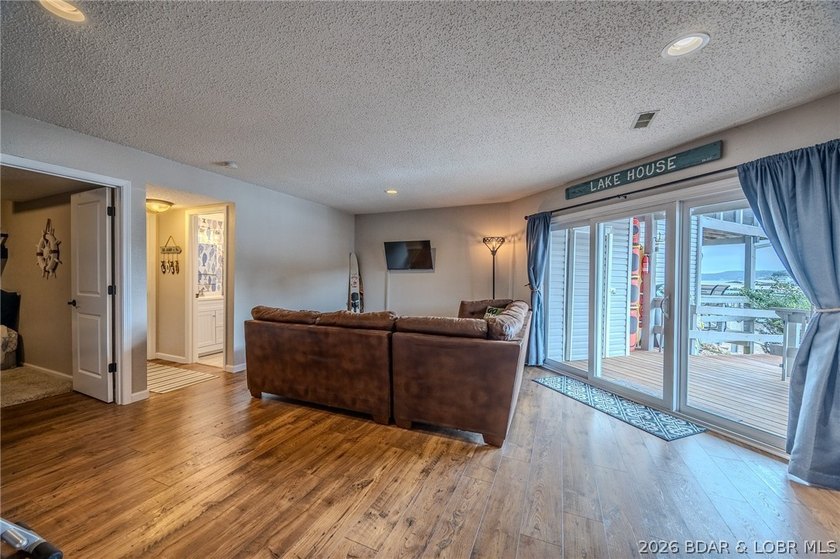 Welcome to 14 Bentwood Dr at the 3 Mile Marker of the Lake of - photo 6
