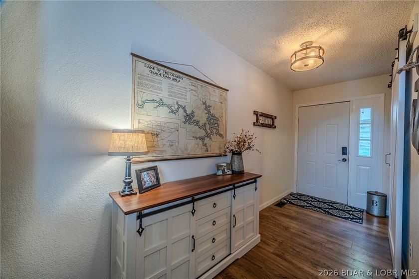 Welcome to 14 Bentwood Dr at the 3 Mile Marker of the Lake of - photo 8