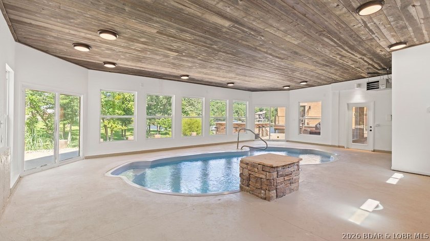 Luxury lakefront home located in a highly sought-after cove at - photo 3