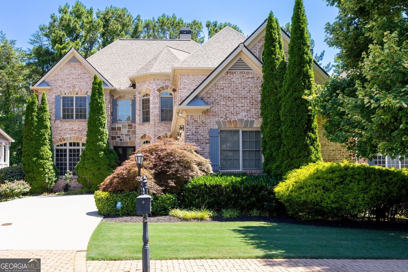 Nestled behind the gates of prestigious Haynes Manor, one of - photo 3