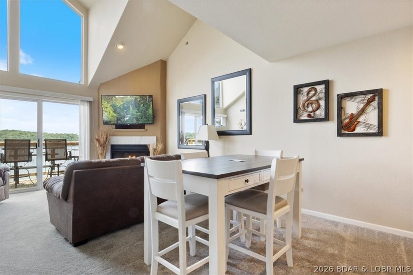 This beautifully updated condo sits high above the lake with - photo 5