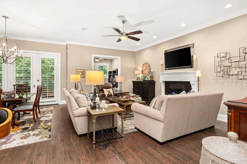 Experience refined luxury in this custom patio home. The - photo 5