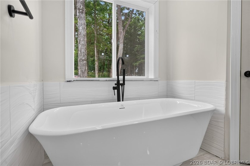 NEW CONSTRUCTION at the 63 MM in Emerald Hills gated community - photo 26
