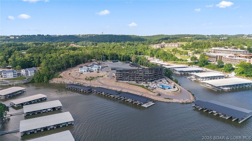 UPSCALE LAKEFRONT CONDO! Discover style with this 2023-built - photo 8