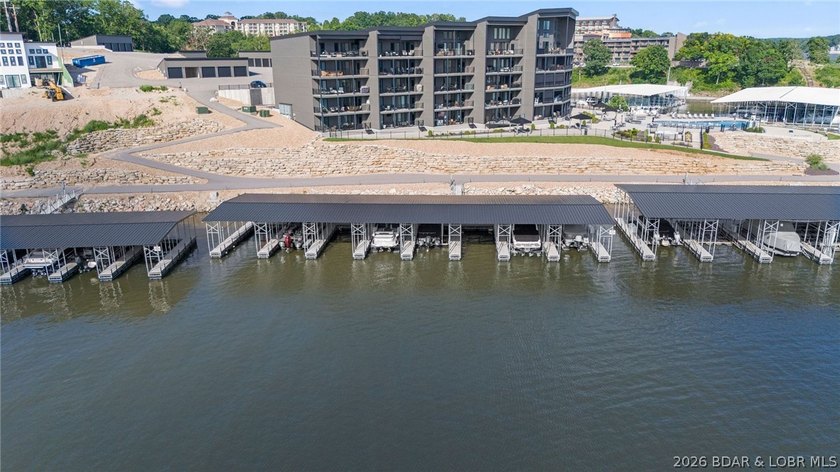 UPSCALE LAKEFRONT CONDO! Discover style with this 2023-built - photo 9