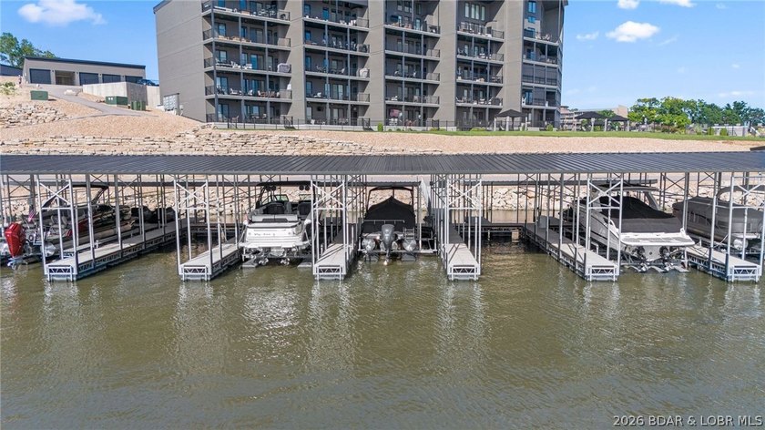 UPSCALE LAKEFRONT CONDO! Discover style with this 2023-built - photo 10