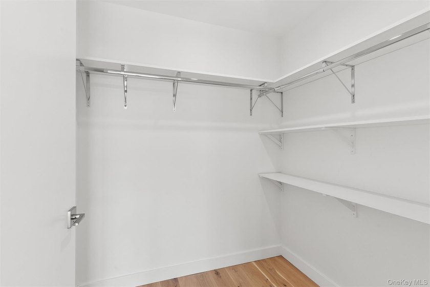 Experience elevated coastal living in this stunning one-bedroom - photo 12
