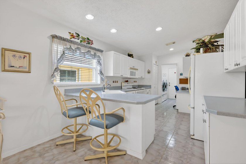 Enjoy stunning long lake views from sunrise to sunset in this - photo 18