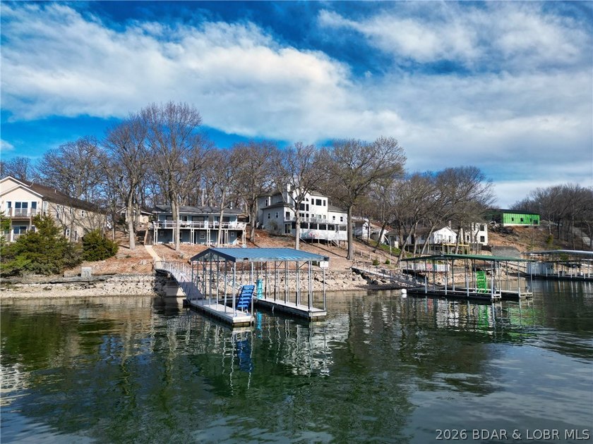 Enjoy unbeatable lake views from this beautifully updated - photo 2