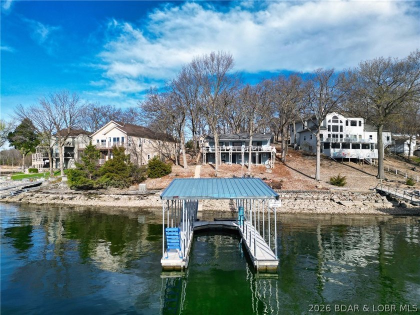 Enjoy unbeatable lake views from this beautifully updated - photo 3