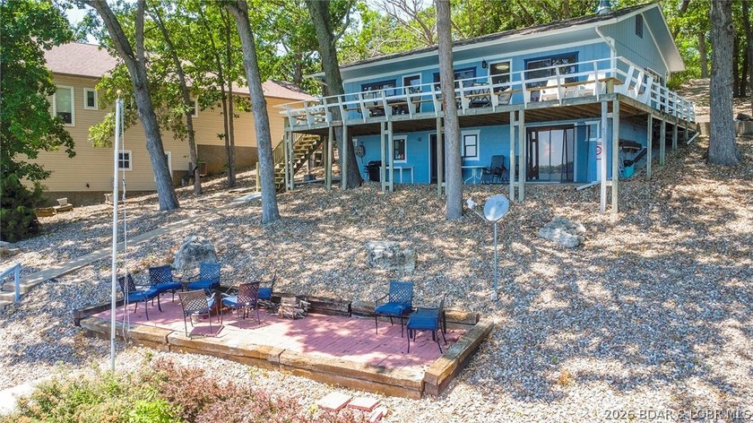 Enjoy unbeatable lake views from this beautifully updated - photo 4