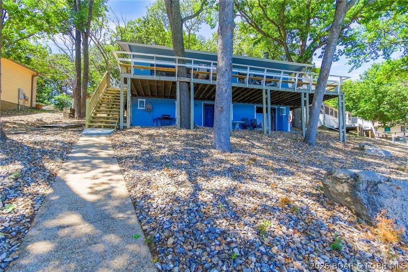 Enjoy unbeatable lake views from this beautifully updated - photo 5