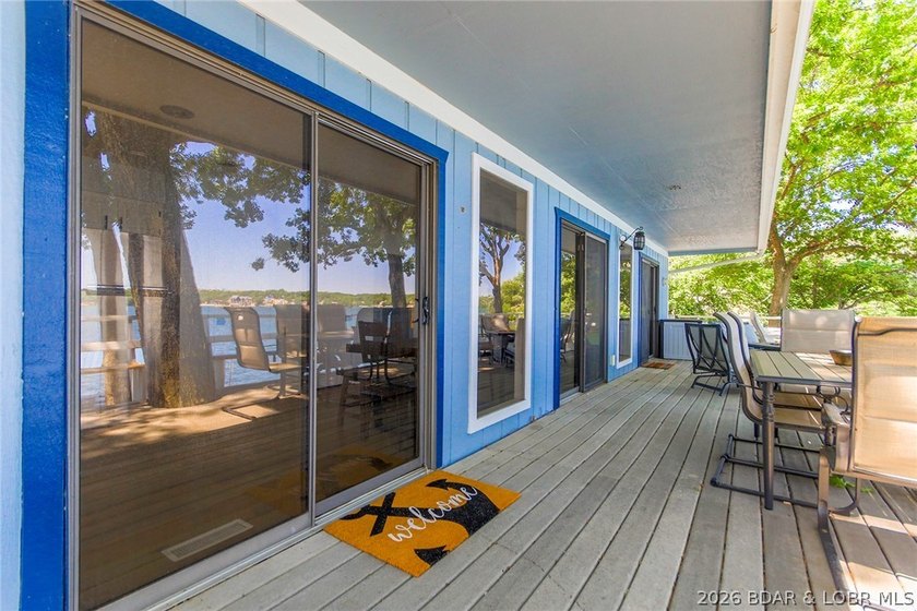 Enjoy unbeatable lake views from this beautifully updated - photo 6