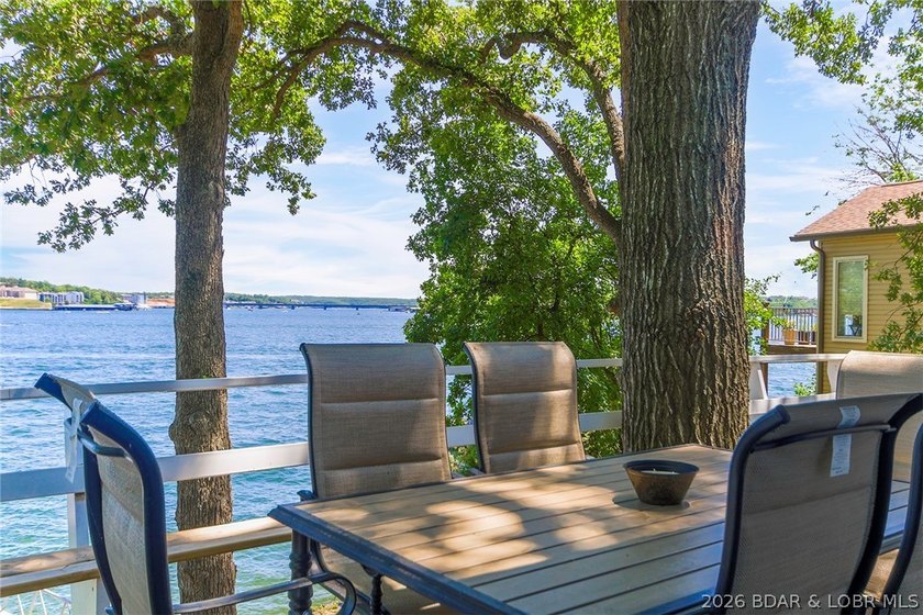 Enjoy unbeatable lake views from this beautifully updated - photo 7