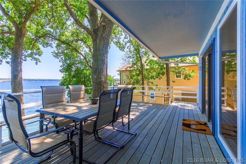 Enjoy unbeatable lake views from this beautifully updated - photo 8