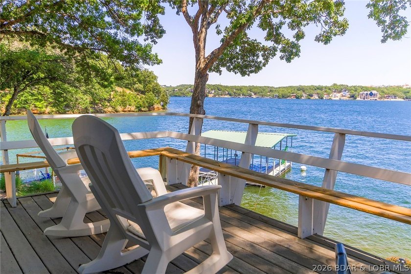 Enjoy unbeatable lake views from this beautifully updated - photo 9