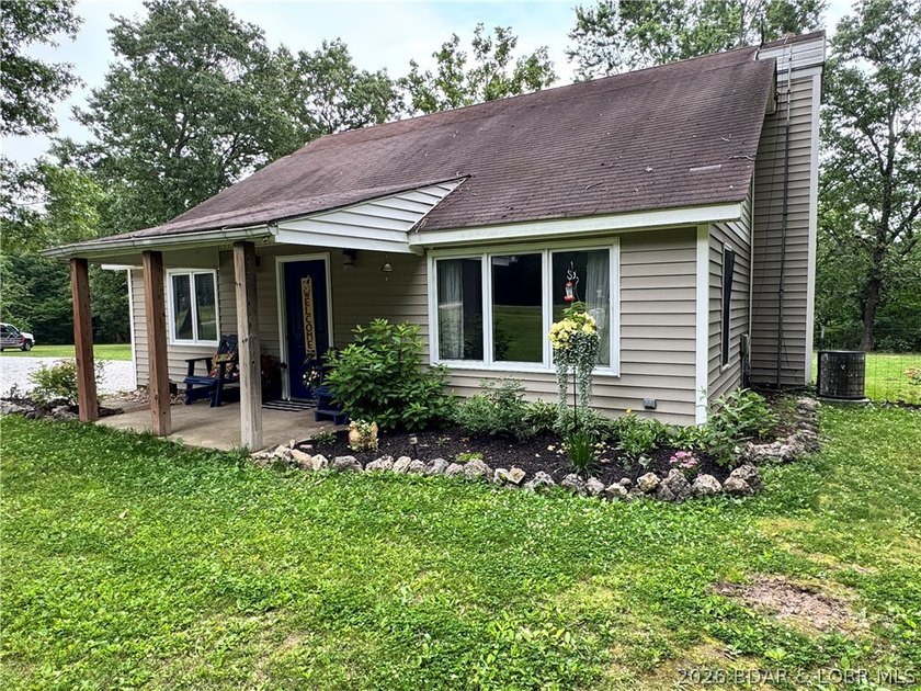 Enjoy peaceful country living on this beautiful 6+ acre property - photo 3