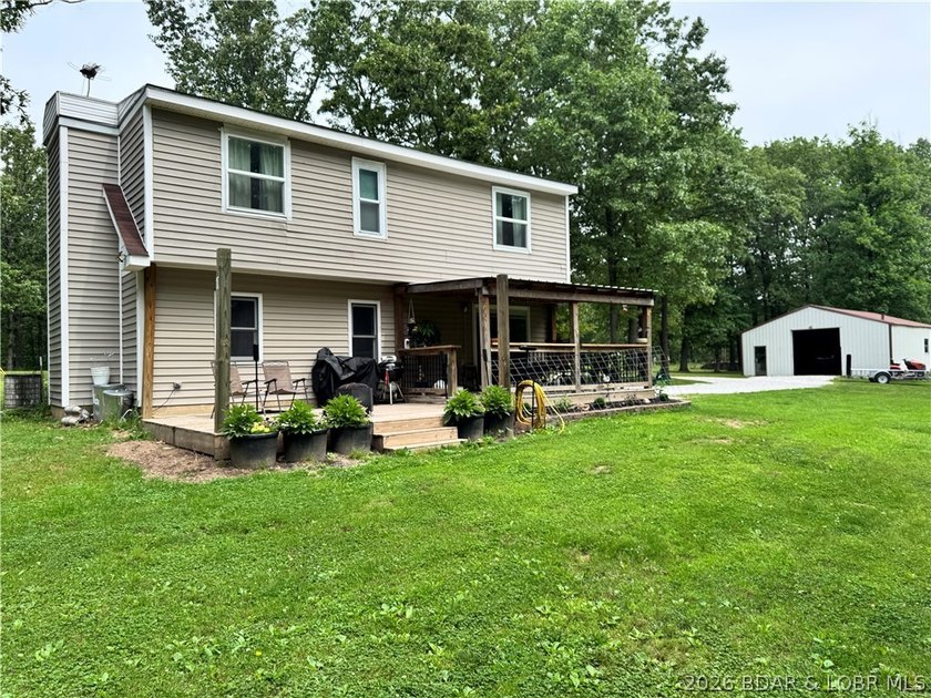 Enjoy peaceful country living on this beautiful 6+ acre property - photo 6