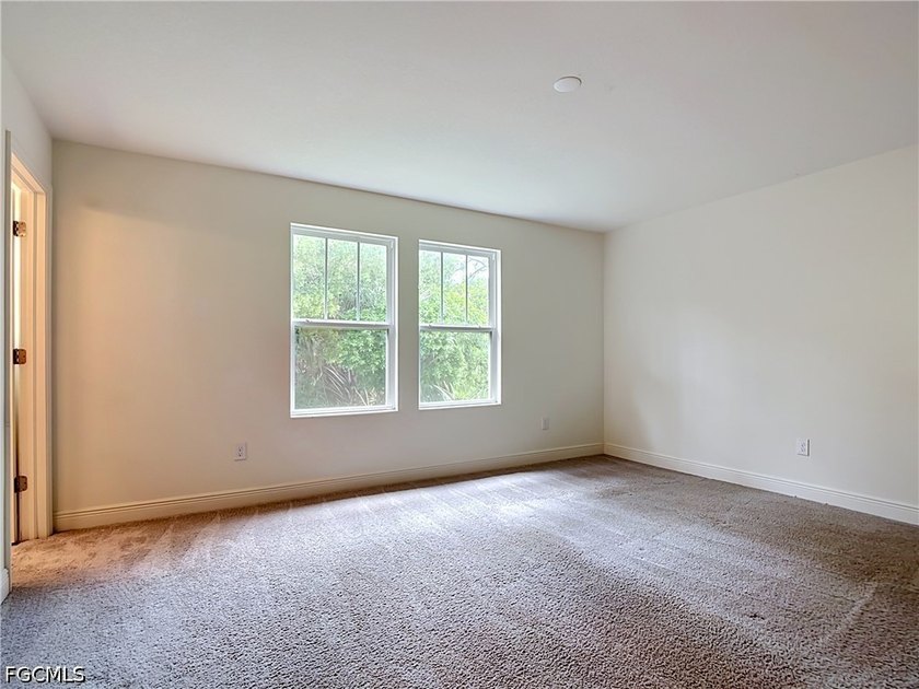 lowest priced 3 bedroom 2.5 bath, home in Bayshore Commons. This - photo 12